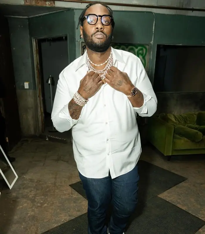 Peezy outfit in Louis Vuitton, Nike, and Tom Ford, 2023