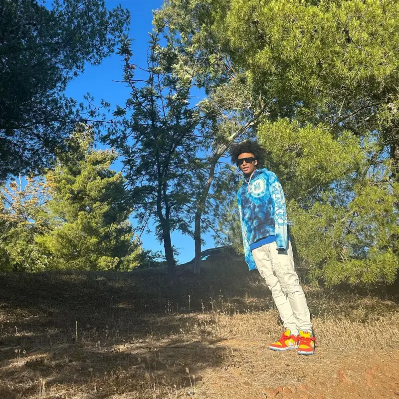Mikey outfit in Amiri, Purple Brand, and Louis Vuitton, 2023