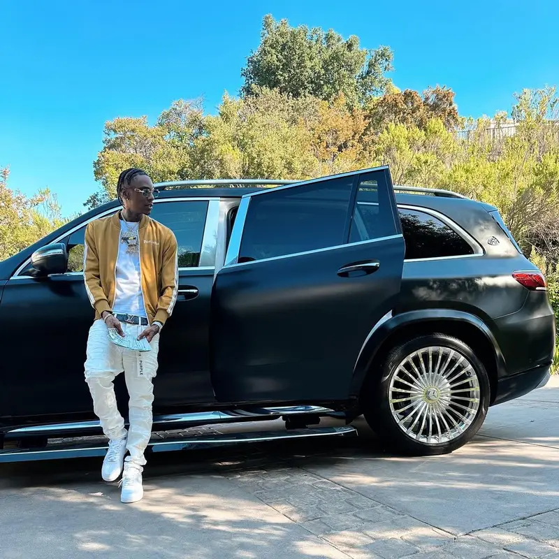 Soulja Boy outfit in Palm Angels, Louis Vuitton, and Cartier, 2023