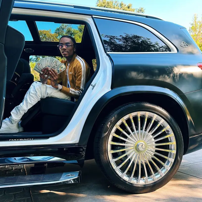 Soulja Boy outfit in Palm Angels, Louis Vuitton, and Cartier, 2023