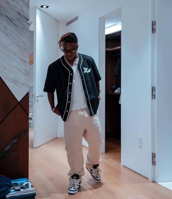 Vinicius Jr outfit in Louis Vuitton and Prada, 2023