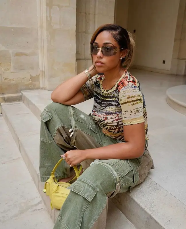 Jordyn Woods outfit in Miu Miu and By Far, 2023