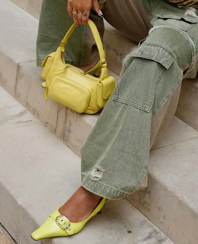 Jordyn Woods outfit in Miu Miu and By Far, 2023