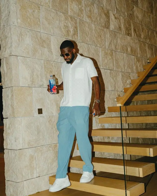 Fikayo Tomori outfit in Louis Vuitton, Issey Miyake, and Cartier, 2023