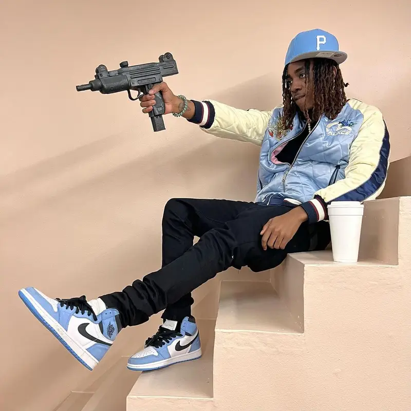 Eem Triplin outfit in Palace, New Era, and Evisu, 2023