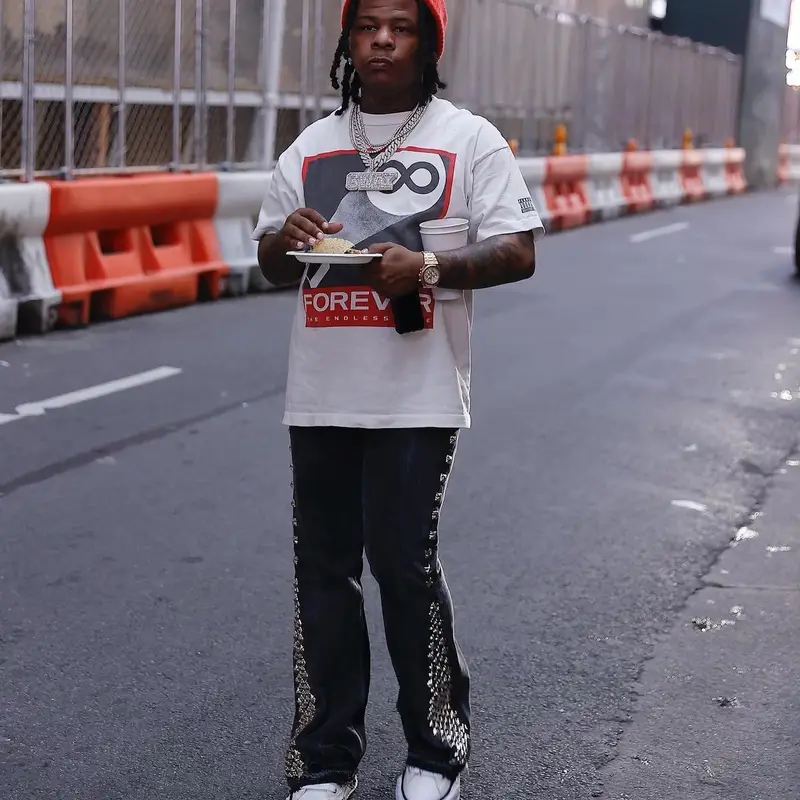 Rylo Rodriguez outfit in Saint Michael, Gallery Dept., and Louis Vuitton, 2023