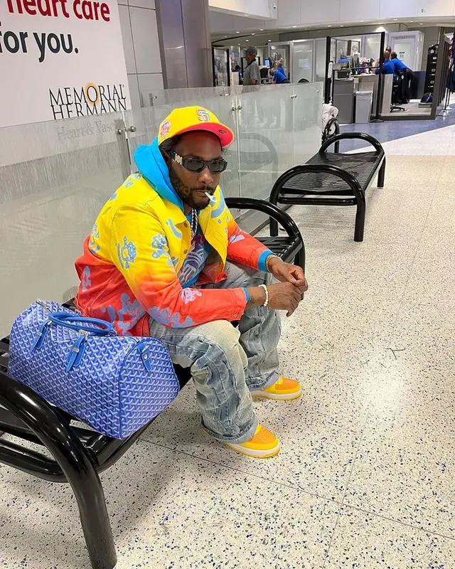 Peezy outfit in Denim Tears, Versace, and New Era, 2023