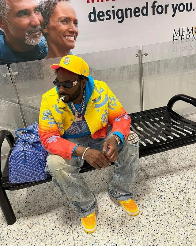 Peezy outfit in Denim Tears, Versace, and New Era, 2023