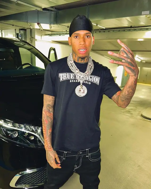 NLE Choppa outfit in True Religion and Nike, 2023