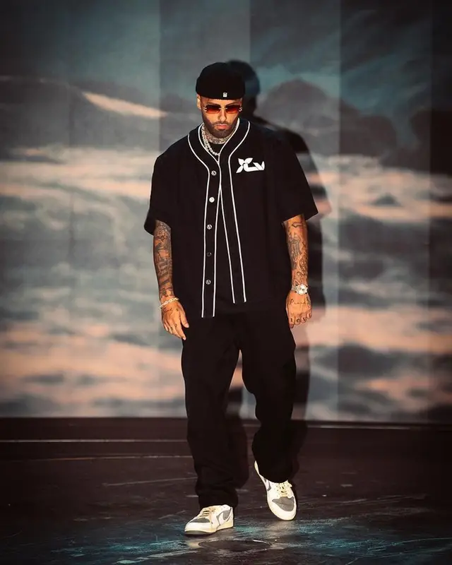 Nicky Jam outfit in Louis Vuitton, Nike, and Cartier, 2023