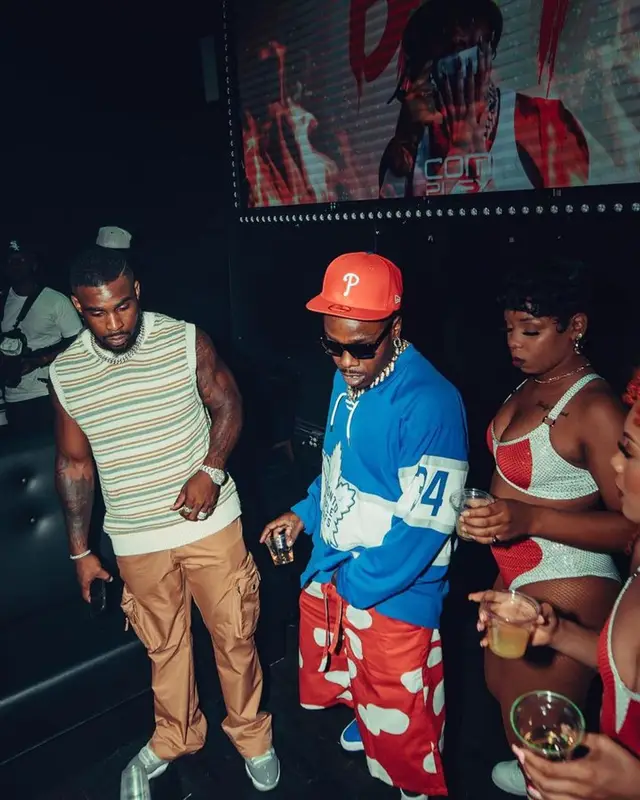 DaBaby outfit in Mitchell & Ness, Nike, and New Era, 2023
