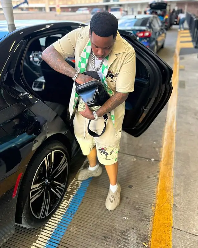 Finesse2tymes outfit in Vieriche, Adidas, and Louis Vuitton, 2023