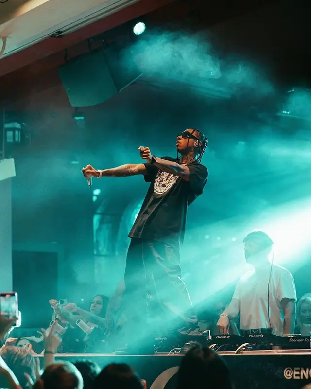 Tyga outfit in Givenchy, Code, and Prada, 2023