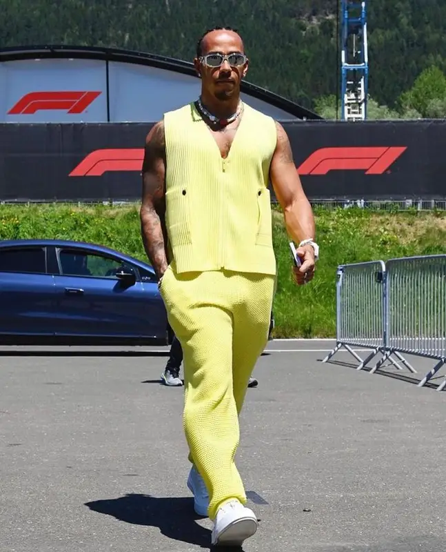 Lewis Hamilton outfit in Issey Miyake, Zegna, and Versace, 2023