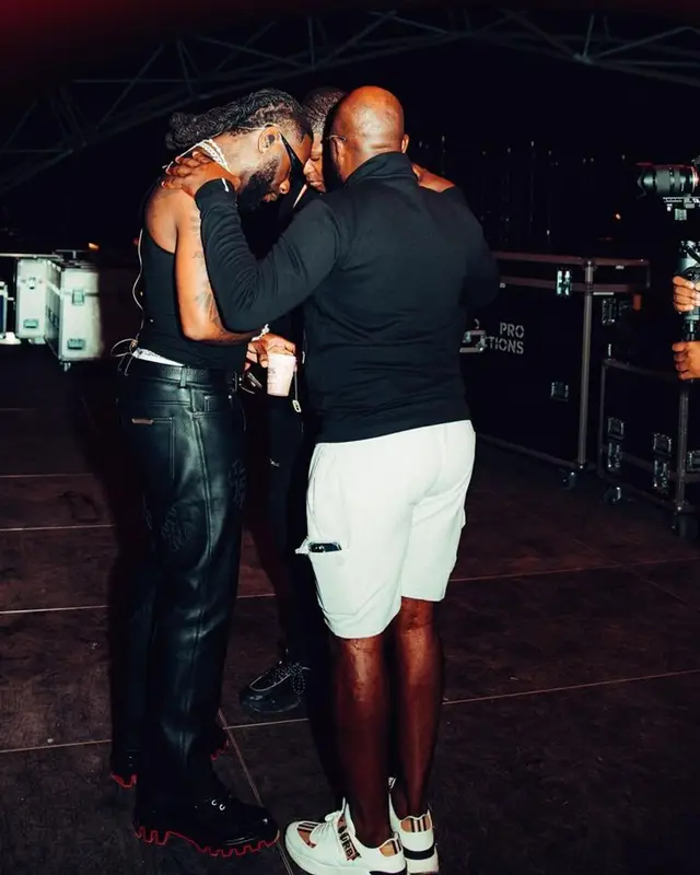 Burna Boy outfit in Chrome Hearts, Christian Louboutin, and Amiri, 2023