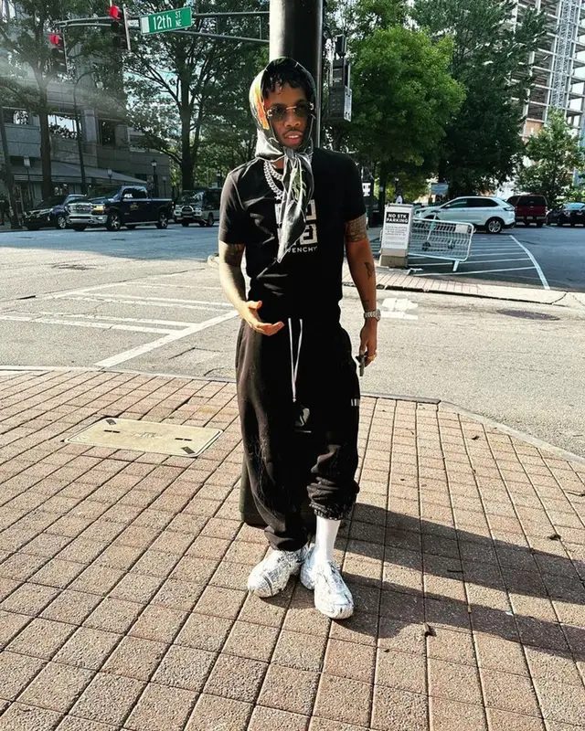 Tekno outfit in Givenchy, Amiri, and Dolce & Gabbana, 2023