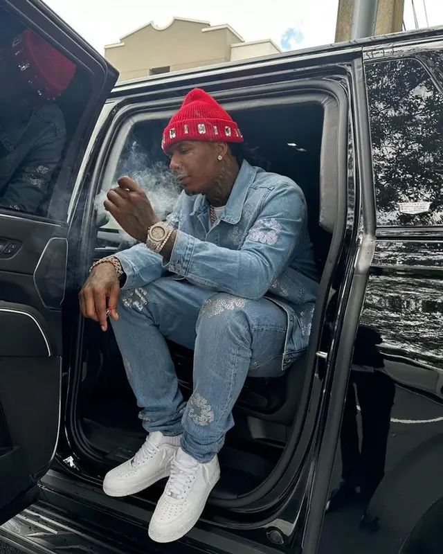 Moneybagg Yo outfit in Denim Tears, Supreme, and Nike, 2023