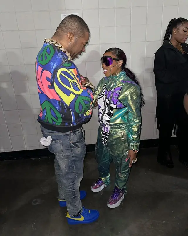 Busta Rhymes outfit in Loewe, Purple Brand, and Nike, 2023
