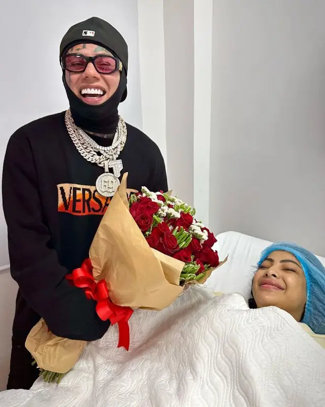 6ix9ine outfit in Amiri, Versace, and New Era, 2023