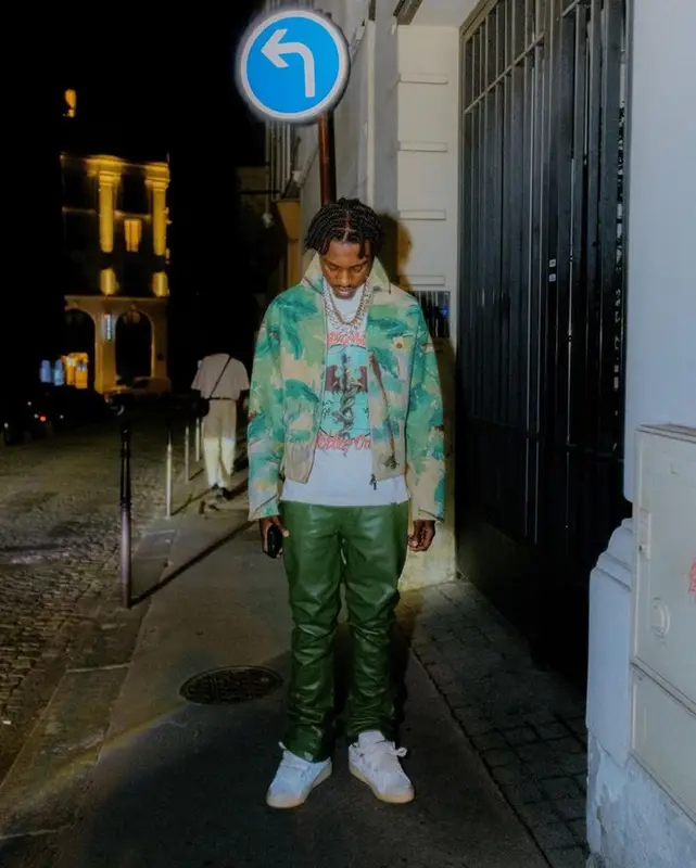 Lil Tjay outfit in Emporio Armani, Represent, and Louis Vuitton, 2023