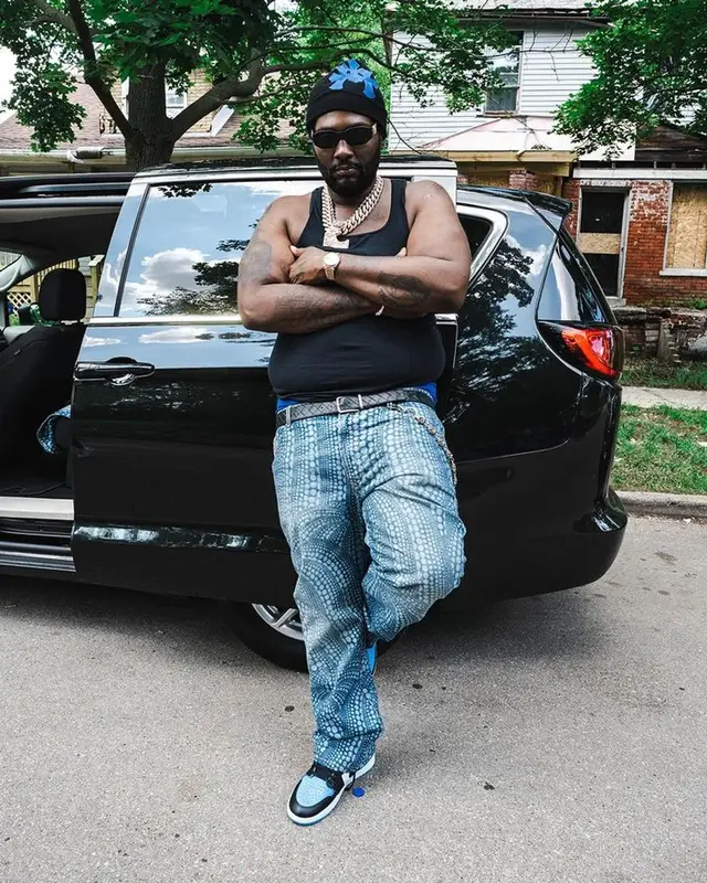 Peezy outfit in Louis Vuitton, Versace, and Chrome Hearts, 2023
