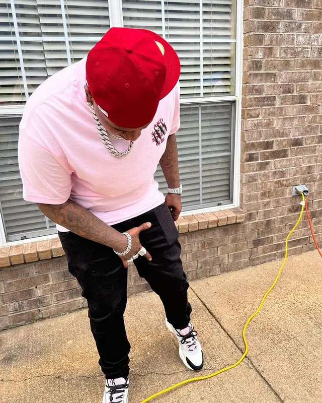 Finesse2tymes outfit in Anti Social Social Club, Amiri, and Dior, 2023
