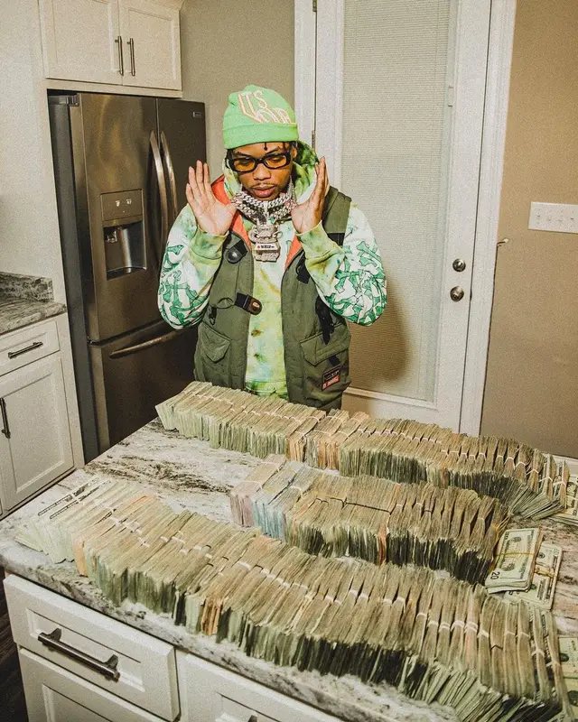 Lil Migo outfit in Life Code, Amiri, and Reves Paris, 2023
