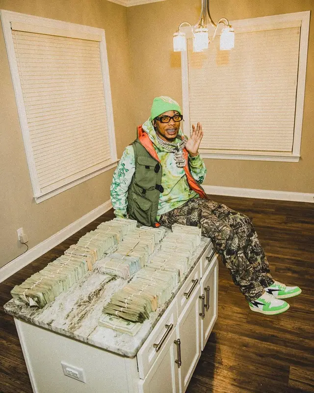 Lil Migo outfit in Life Code, Amiri, and Reves Paris, 2023