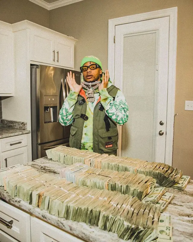 Lil Migo outfit in Life Code, Amiri, and Reves Paris, 2023