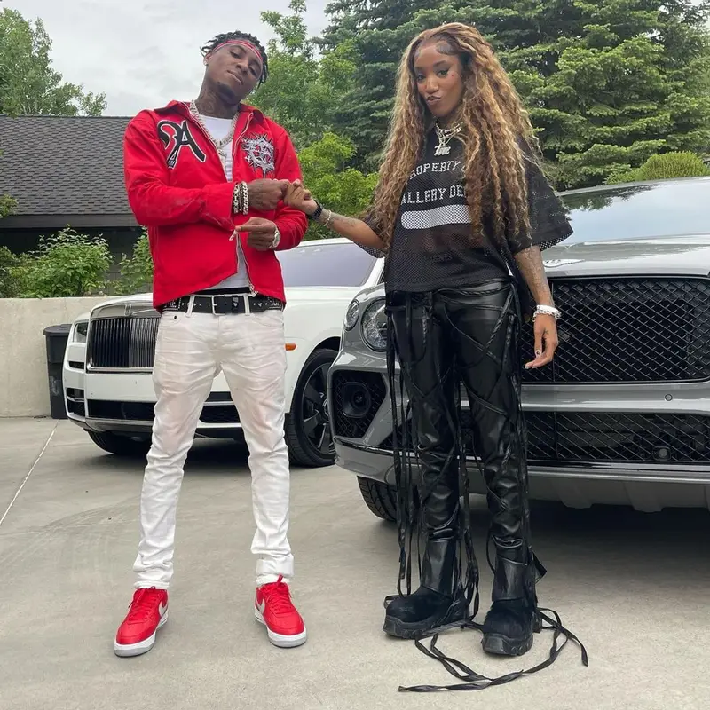 NBA YoungBoy outfit in Purple Brand, Nike, and Supreme, 2023