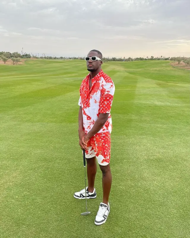 Ibrahima Konate outfit in Louis Vuitton and Prada, 2023