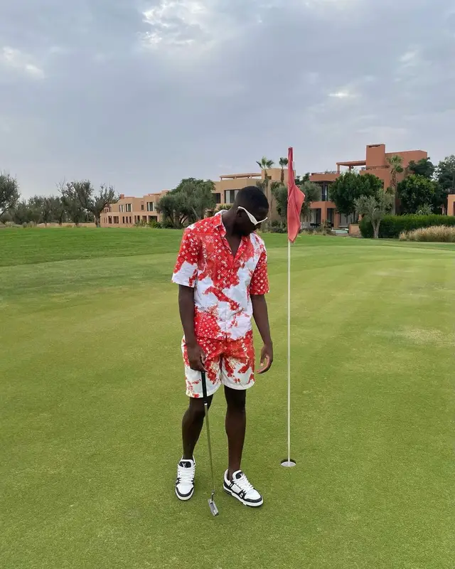 Ibrahima Konate outfit in Louis Vuitton and Prada, 2023