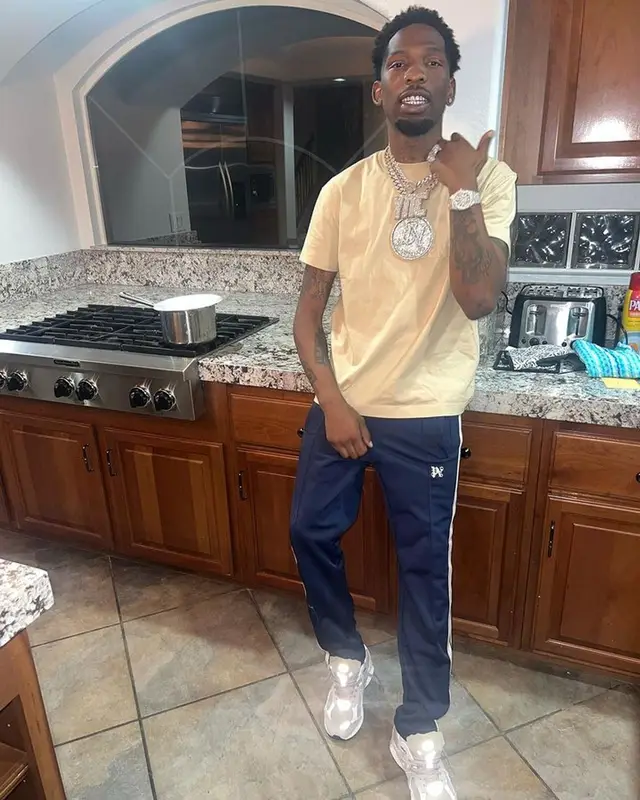 BlocBoy JB outfit in Fear of God, Palm Angels, and New Balance, 2023