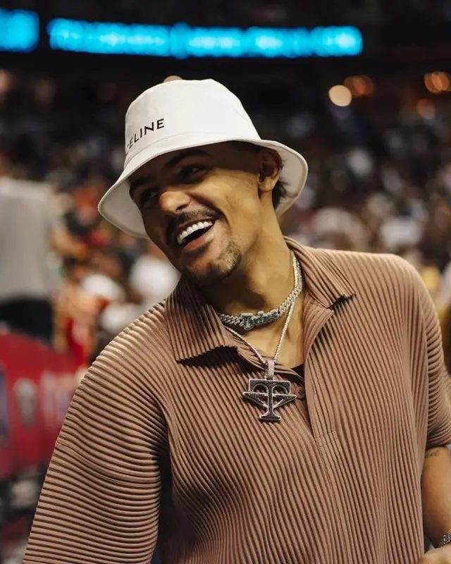 Trae Young outfit in Issey Miyake, Amiri, and Celine, 2023