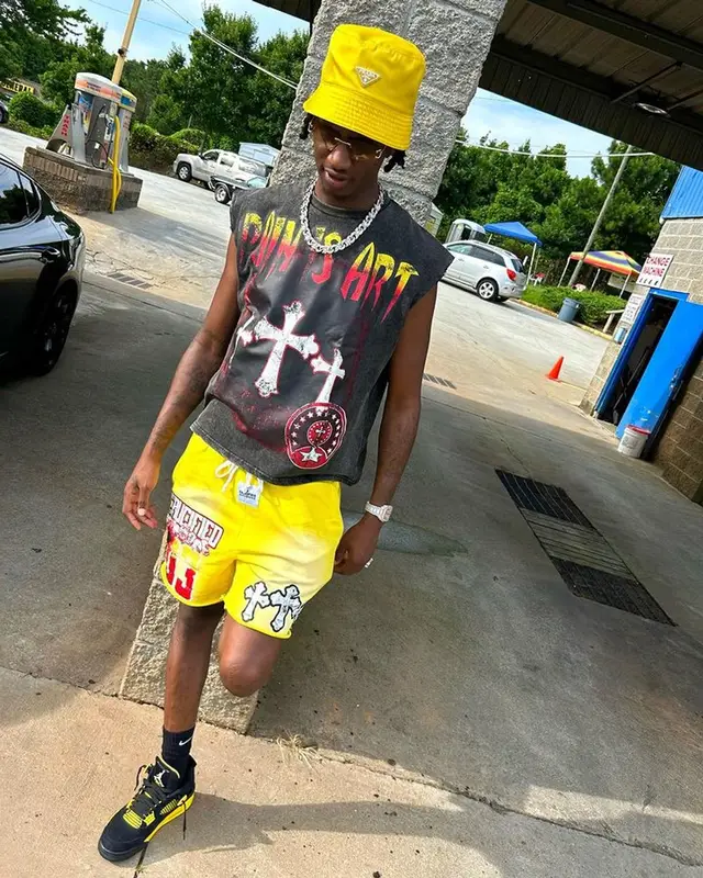 Yung Mal outfit in Jordan, Cartier, and Prada, 2023