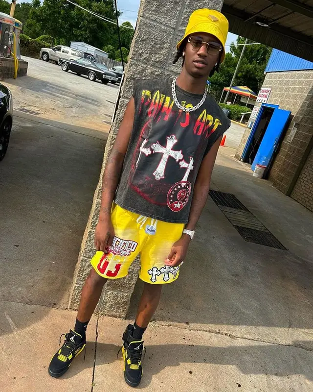 Yung Mal outfit in Jordan, Cartier, and Prada, 2023