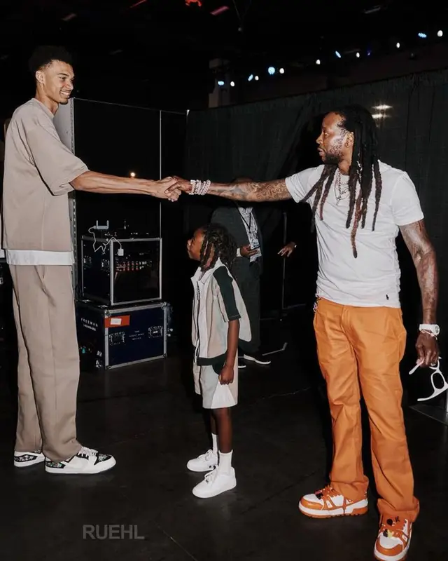 2 Chainz outfit in Polo Ralph Lauren, Gallery Dept., and Balenciaga, 2023