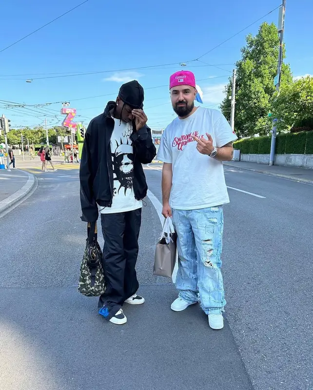 Travis Scott outfit in Bottega Veneta, Cactus Jack, and Louis Vuitton, 2023