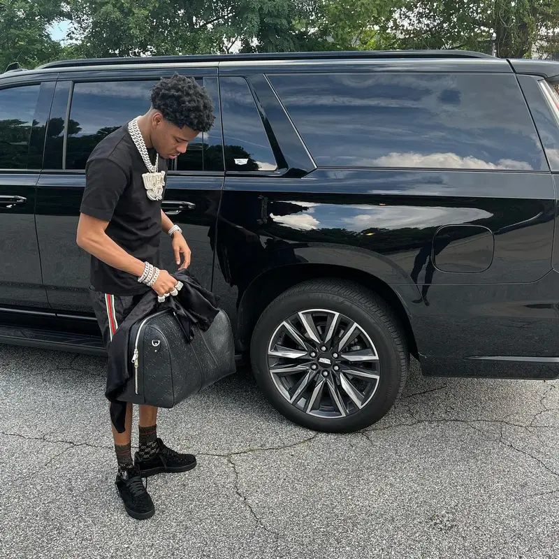 Nardo Wick outfit in Louis Vuitton, Gucci, and Nike, 2023