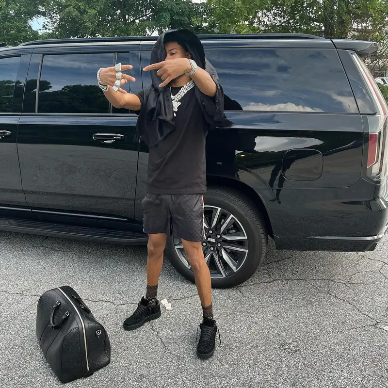 Nardo Wick outfit in Louis Vuitton, Gucci, and Nike, 2023