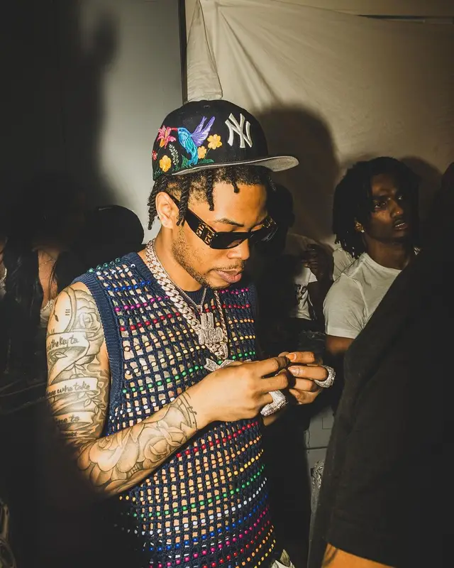 Lil Migo outfit in Supreme, Balenciaga, and New Era, 2023