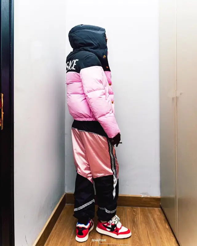 Naira Marley outfit in Versace and Off-White, 2022