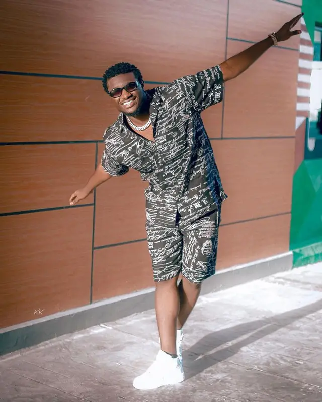 Abisi Emmanuel outfit in Run Fashion, Nike, and Versace, 2023