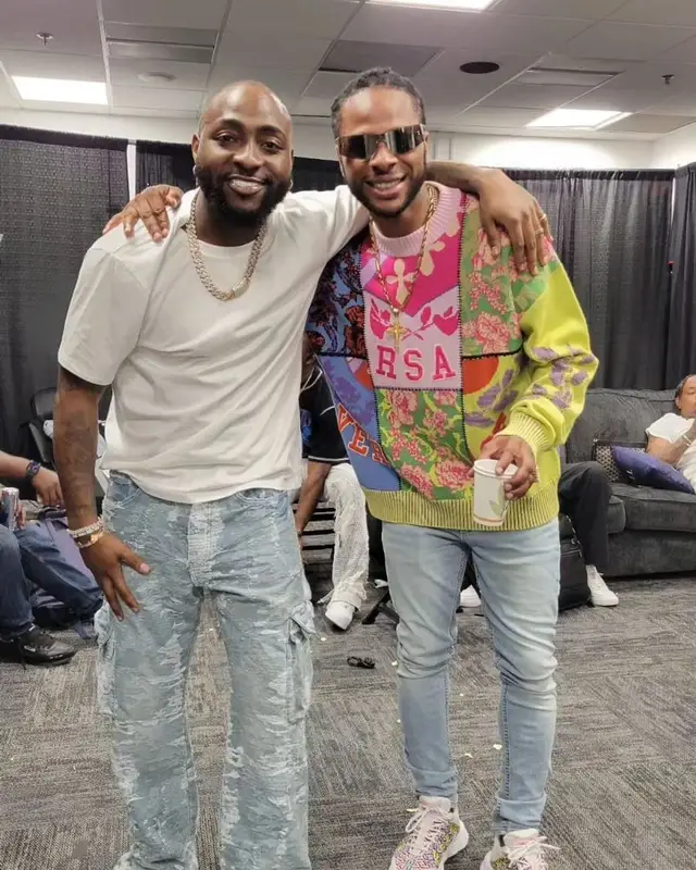 Dexta Daps outfit in Versace and Burberry, 2023
