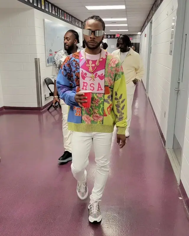 Dexta Daps outfit in Versace and Burberry, 2023