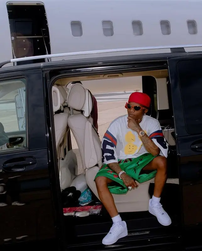 Wizkid outfit in Kapital, Nike, and Bottega Veneta, 2023