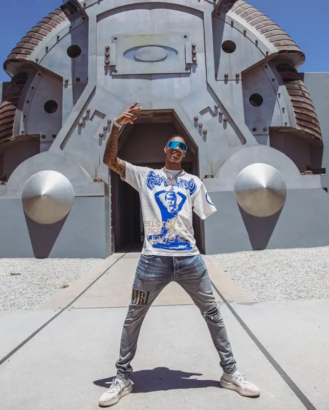 Hansel Enmanuel outfit in Amiri, Adidas, and Oakley, 2023