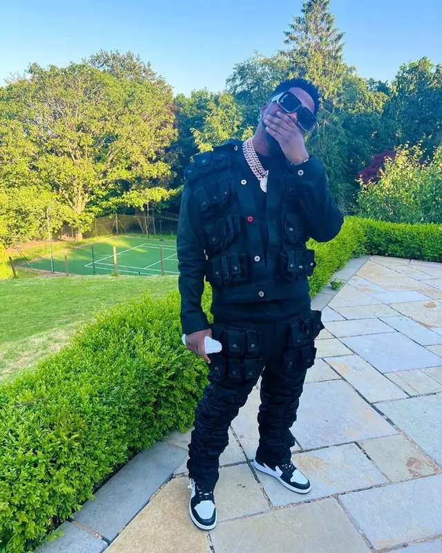 Skiibii outfit in Marc Jacques Burton, Nike, and Loewe, 2023