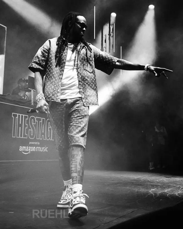 2 Chainz outfit in Louis Vuitton, Balenciaga, and Amiri, 2023