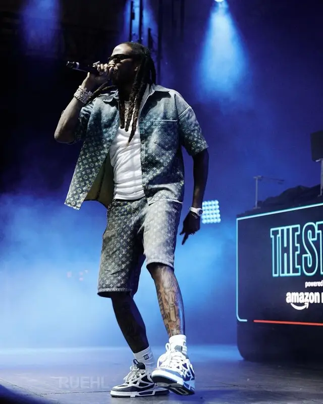 2 Chainz outfit in Louis Vuitton, Balenciaga, and Amiri, 2023